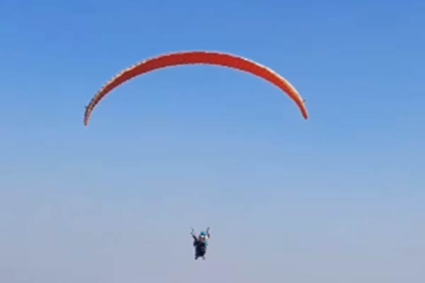 student-reaches-exam-centre-paragliding